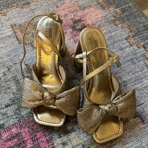ASOS gold bow heels